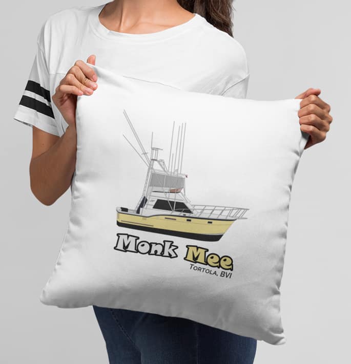 An image of a lady holding a custom throw pillow up with custom boat art on it.