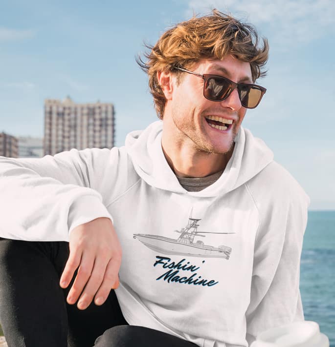 An image of a young man with custom boat hoodie on.