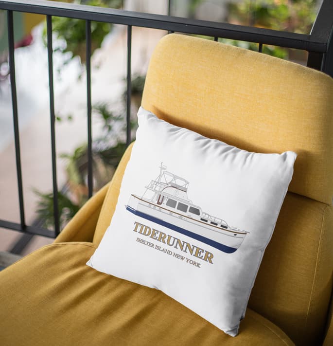 An image of a custom boat throw pillow on a chair.