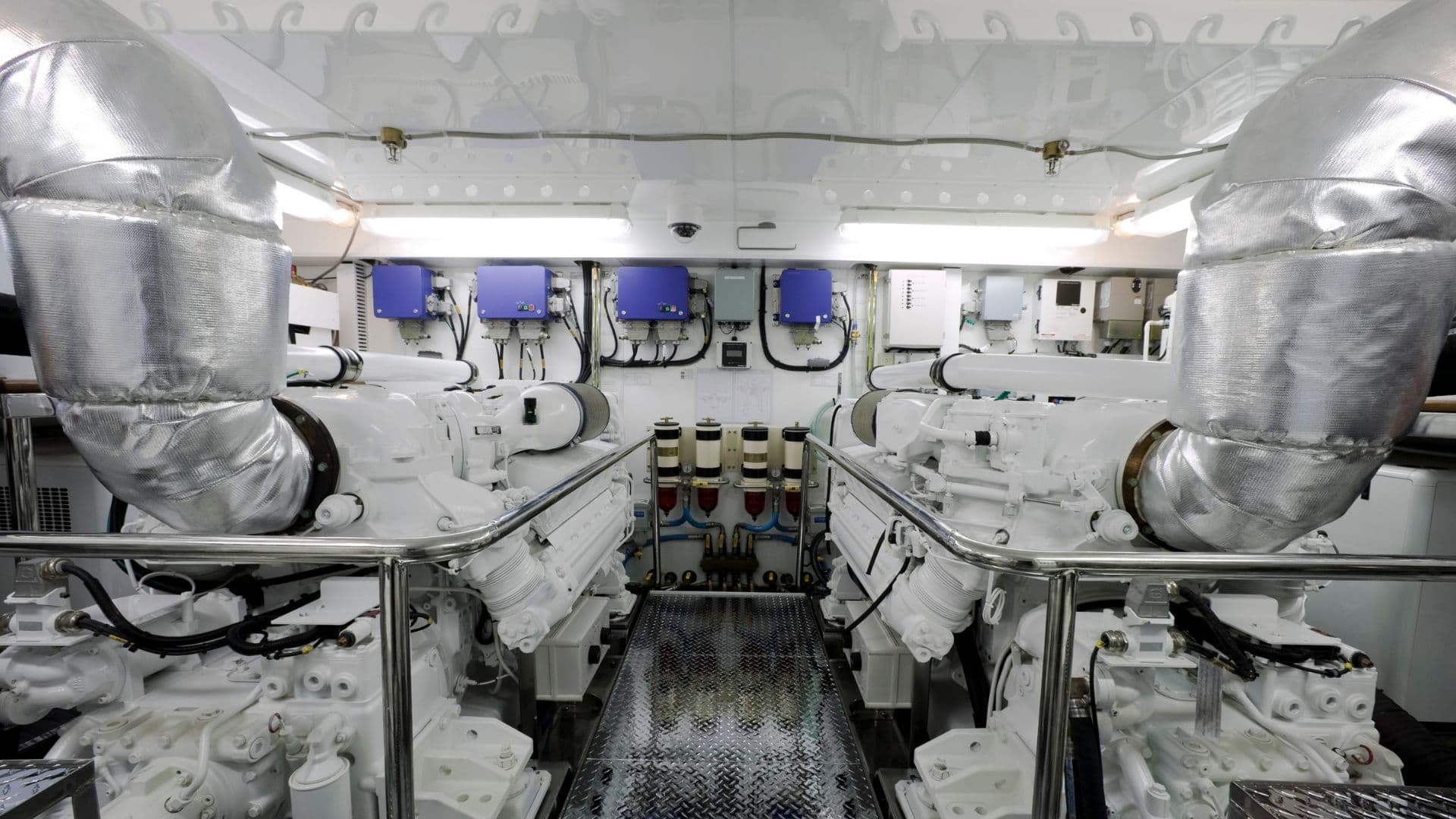 An image of an immaculate engine room onboard a recreational yacht. 