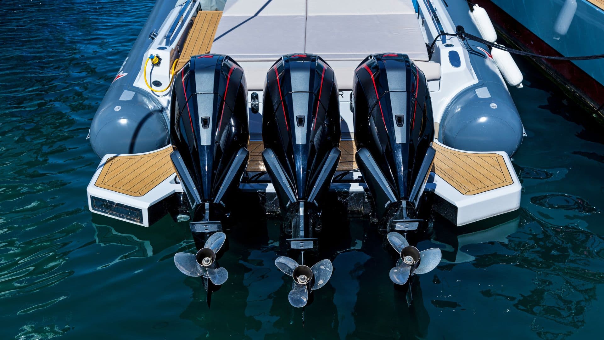 An image of a large center console with outboard engines. 