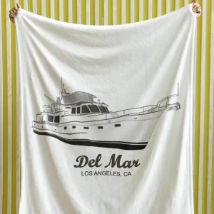 Cozy Fleece Blanket with custom boat art from custom yacht shirts.